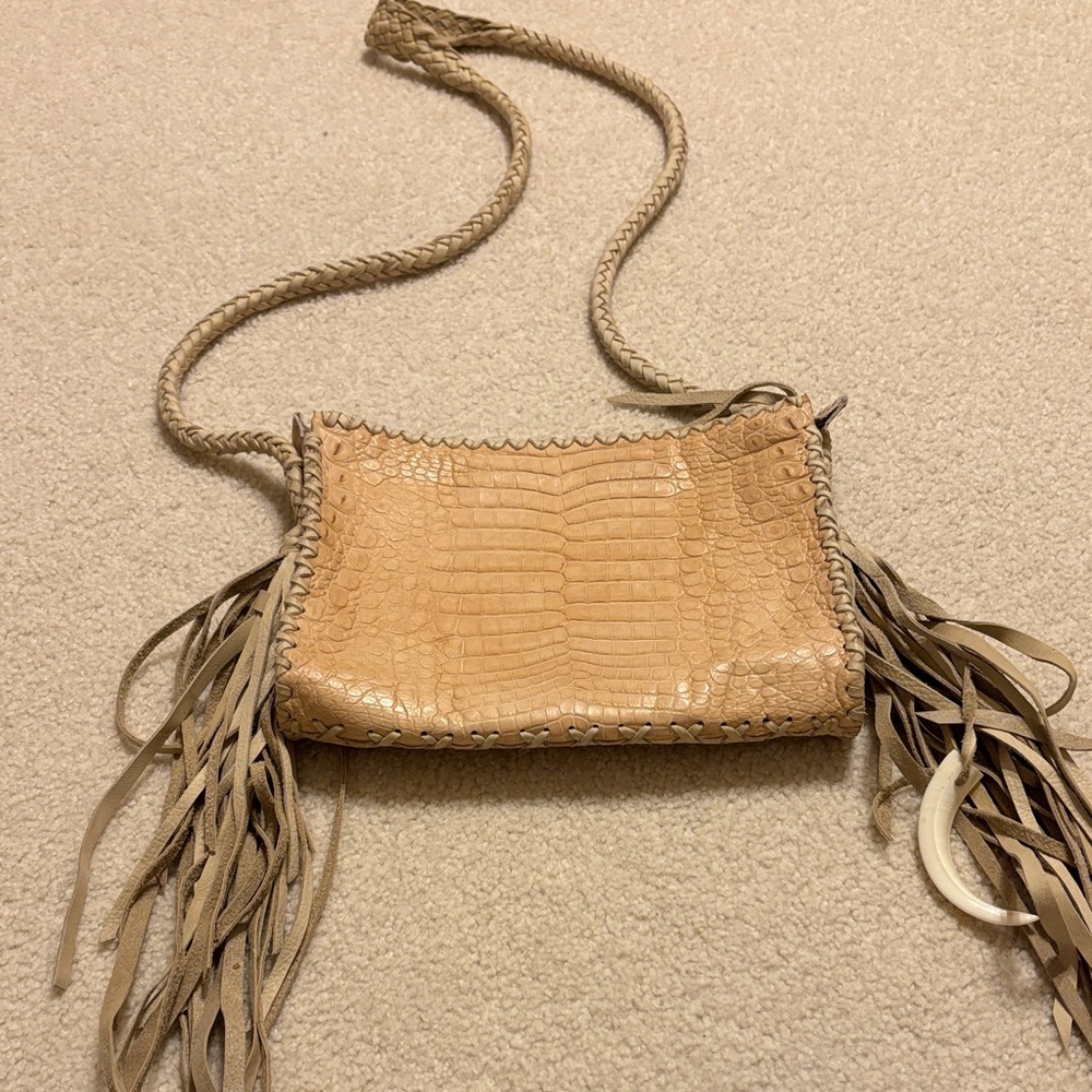 Stylish Tan Crossbody Bag with Fringe